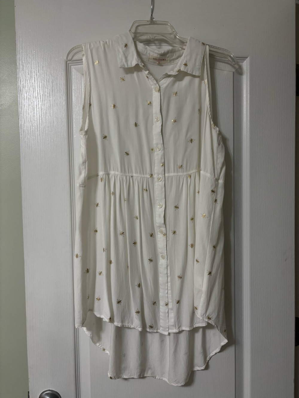 Solitaire White Sleeveless Button-Front Blouse with Gold Bees Embroidered.